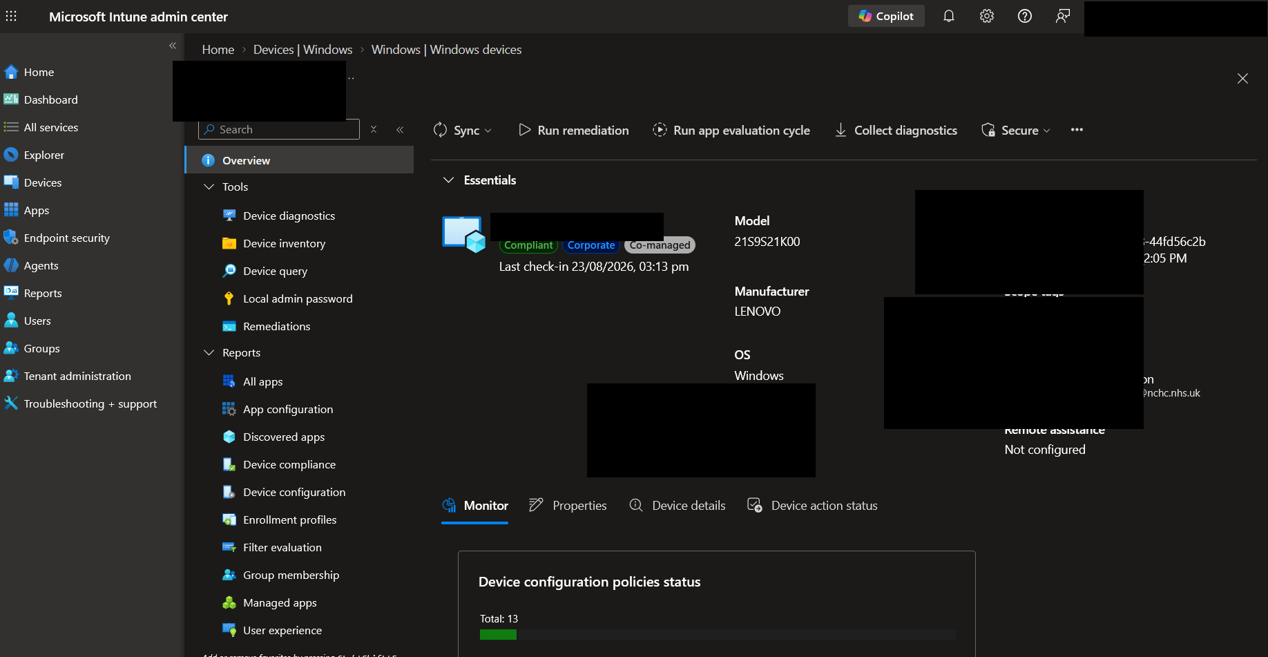 Microsoft Intune admin centre Devices > Windows devices > device Overview, showing Last check-in 23/08/2026 03:13 pm with Compliant, Corporate, and Co-managed badges. Device name, serial, user, and tenant redacted